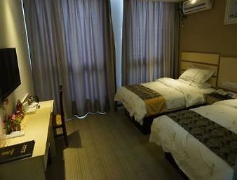 Super 8 Hotel Nantong Qidong Central Bus Station Rum bild